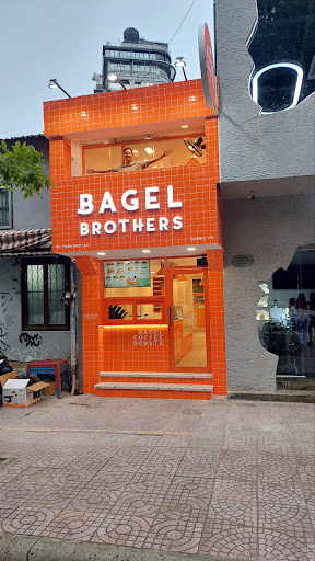 Bagel Brothers’ bright orange café in District 1